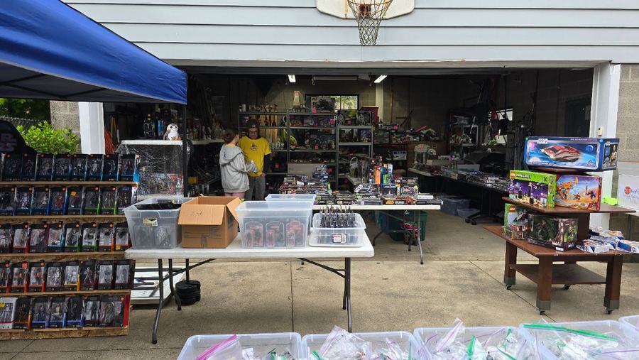 The open garage, with racks of boxed figures and tables of collectibles