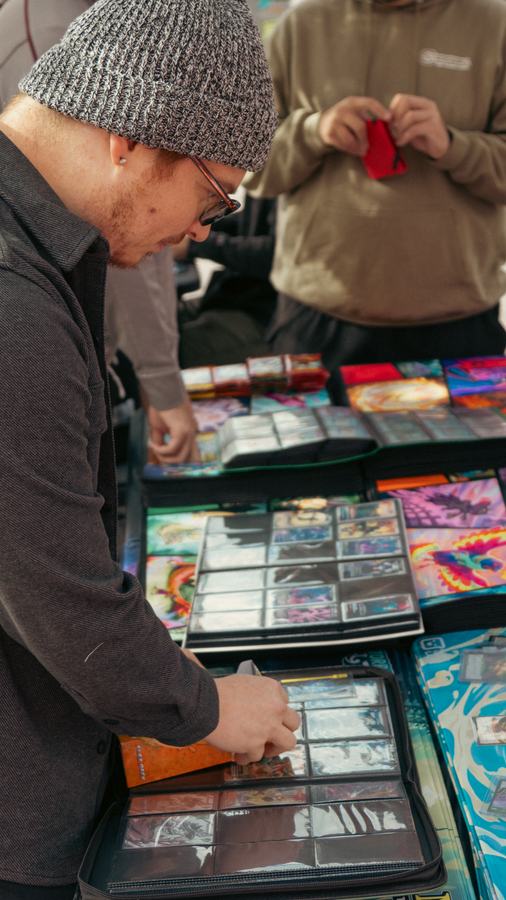 Browsing a binder of trading cards