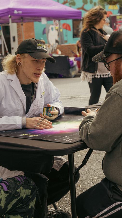 A card match at a street table