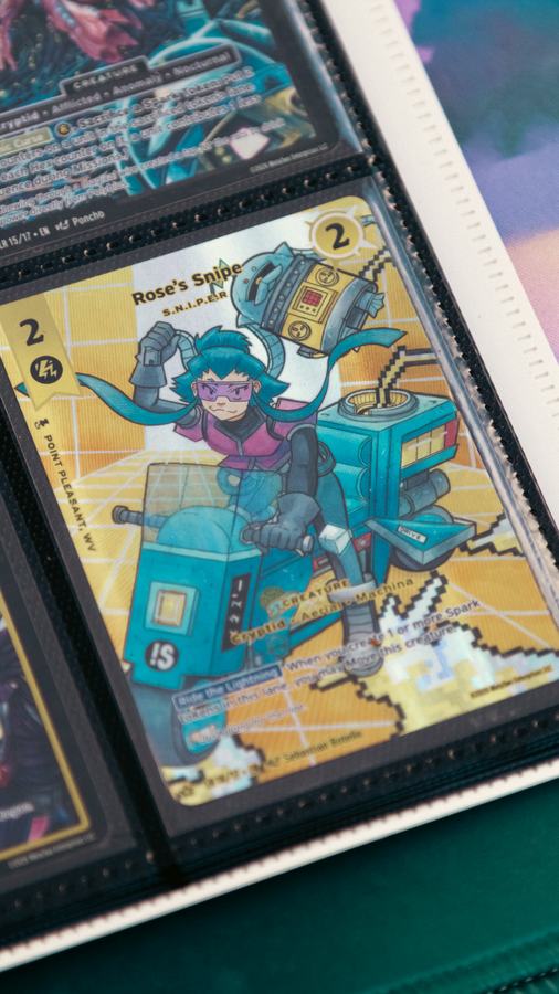 A MetaZoo card in a binder sleeve