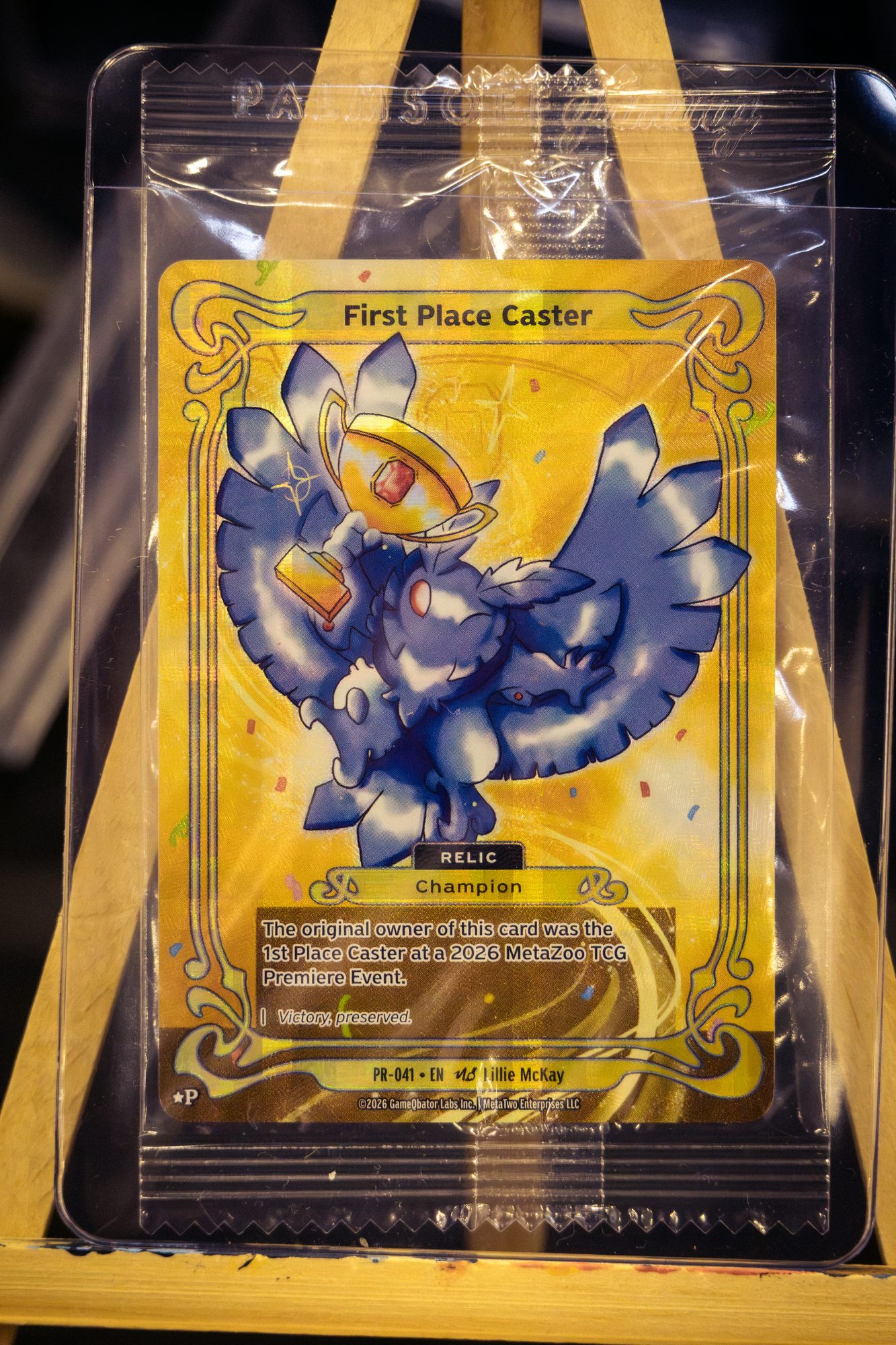 The first-place prize card on an easel