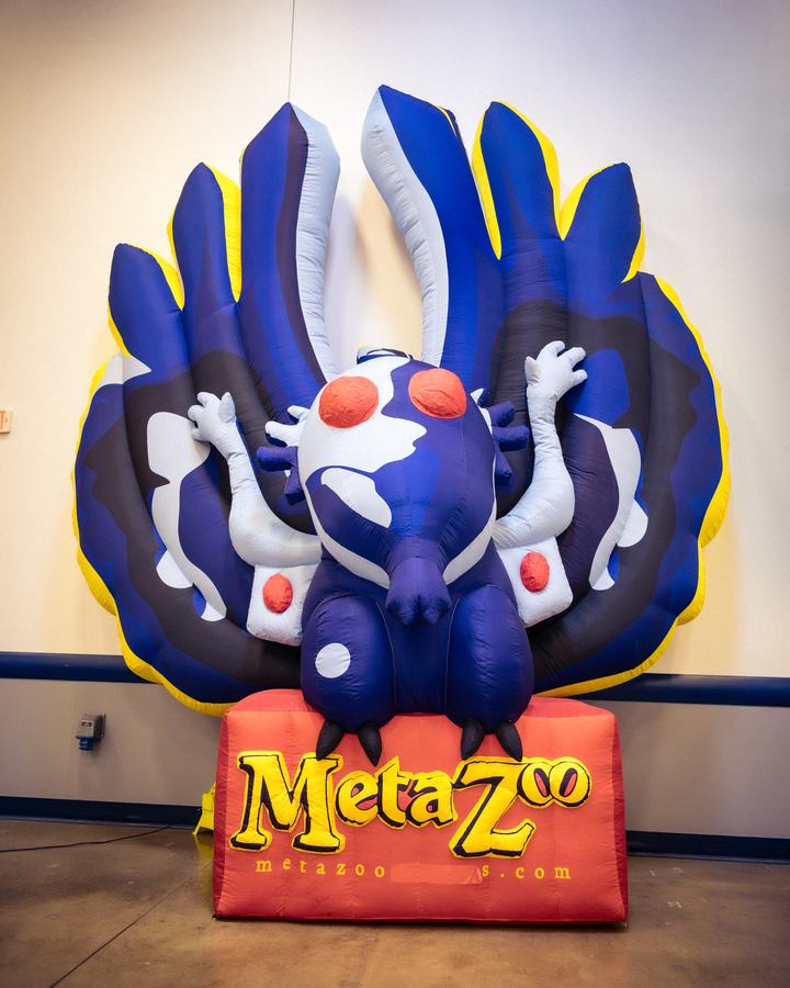 An inflatable winged cryptid on a MetaZoo base