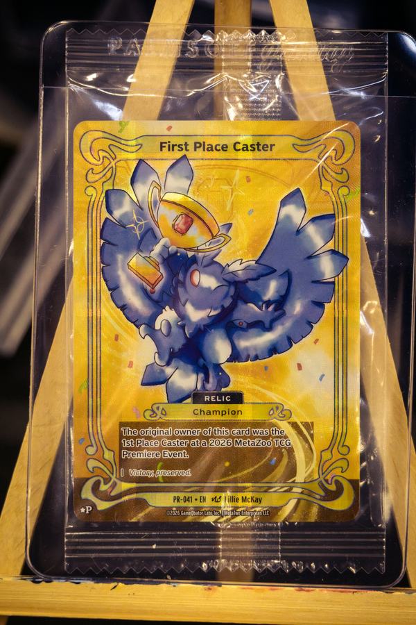 The first-place prize card on an easel