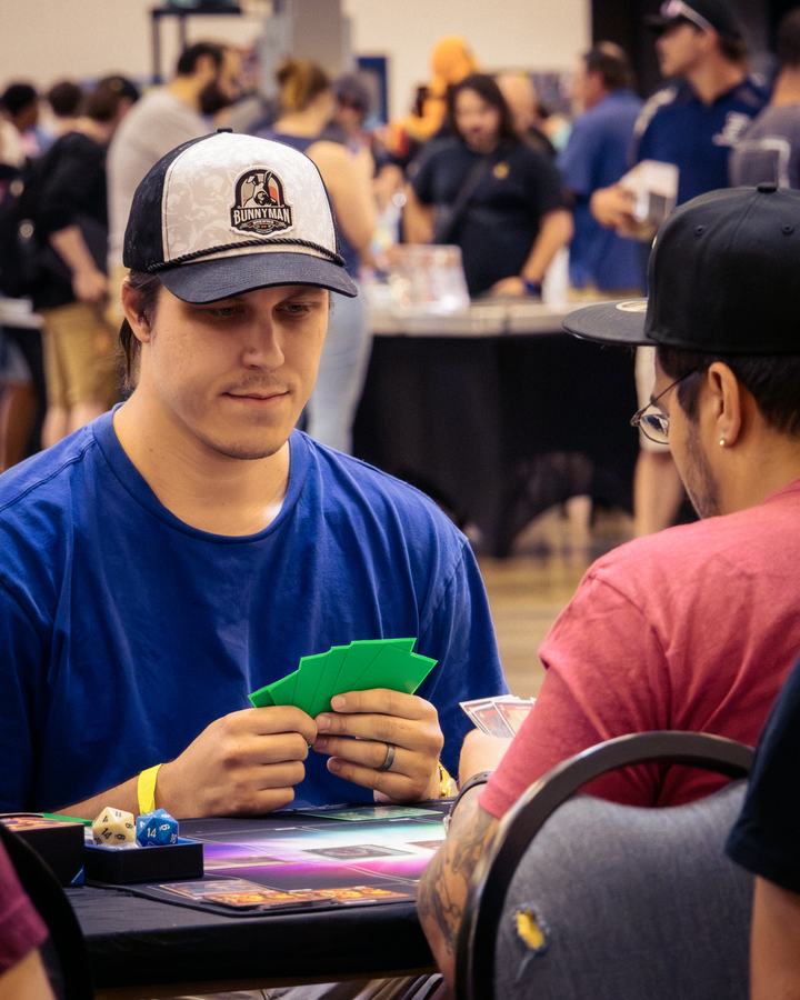 A player fanning his cards