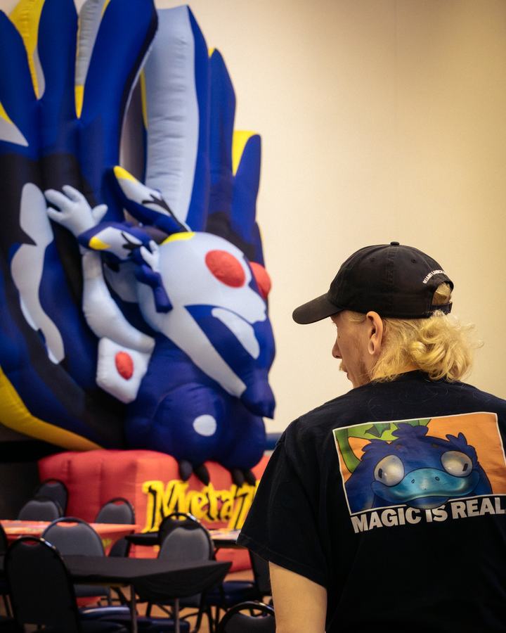 A player beside the inflatable cryptid