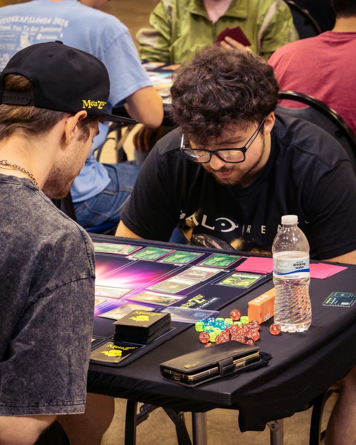 A player in glasses mid-game