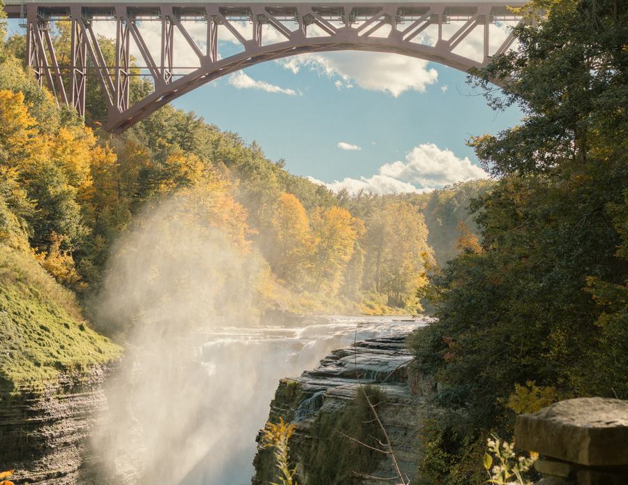 Mist rising beneath the railroad bridge
