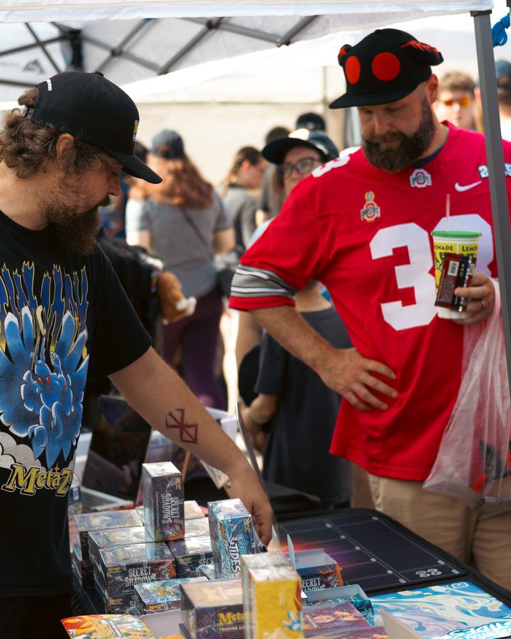 Players shopping the booth display